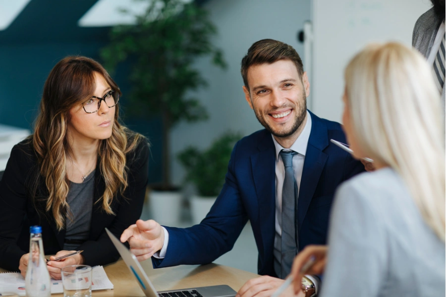 Bookkeeping in Medicine Hat professionals discuss financial strategies at a table